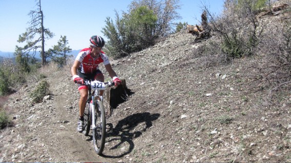 Andy Schultz at the top of climb on his way to winning the Whiskey 50 in Prescott, AZ