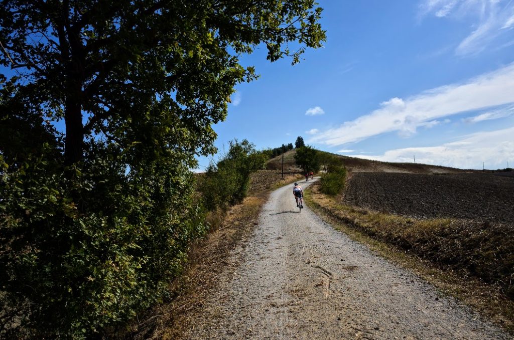 Riding a section of the Strade Bianche.